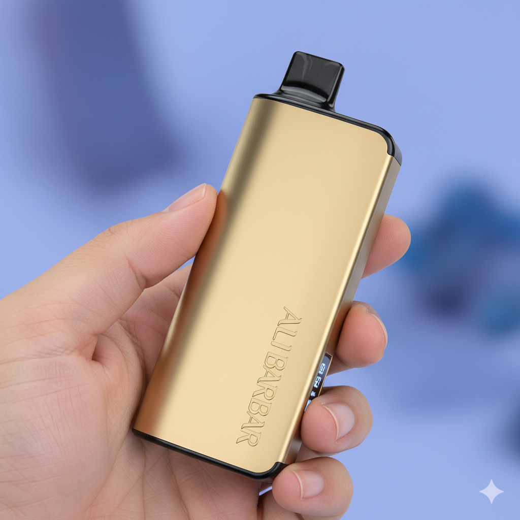 The gold Alibarbar Ingot 9000 Blueberry Blast vape held in hand, with the LED screen showing battery and e-liquid levels.